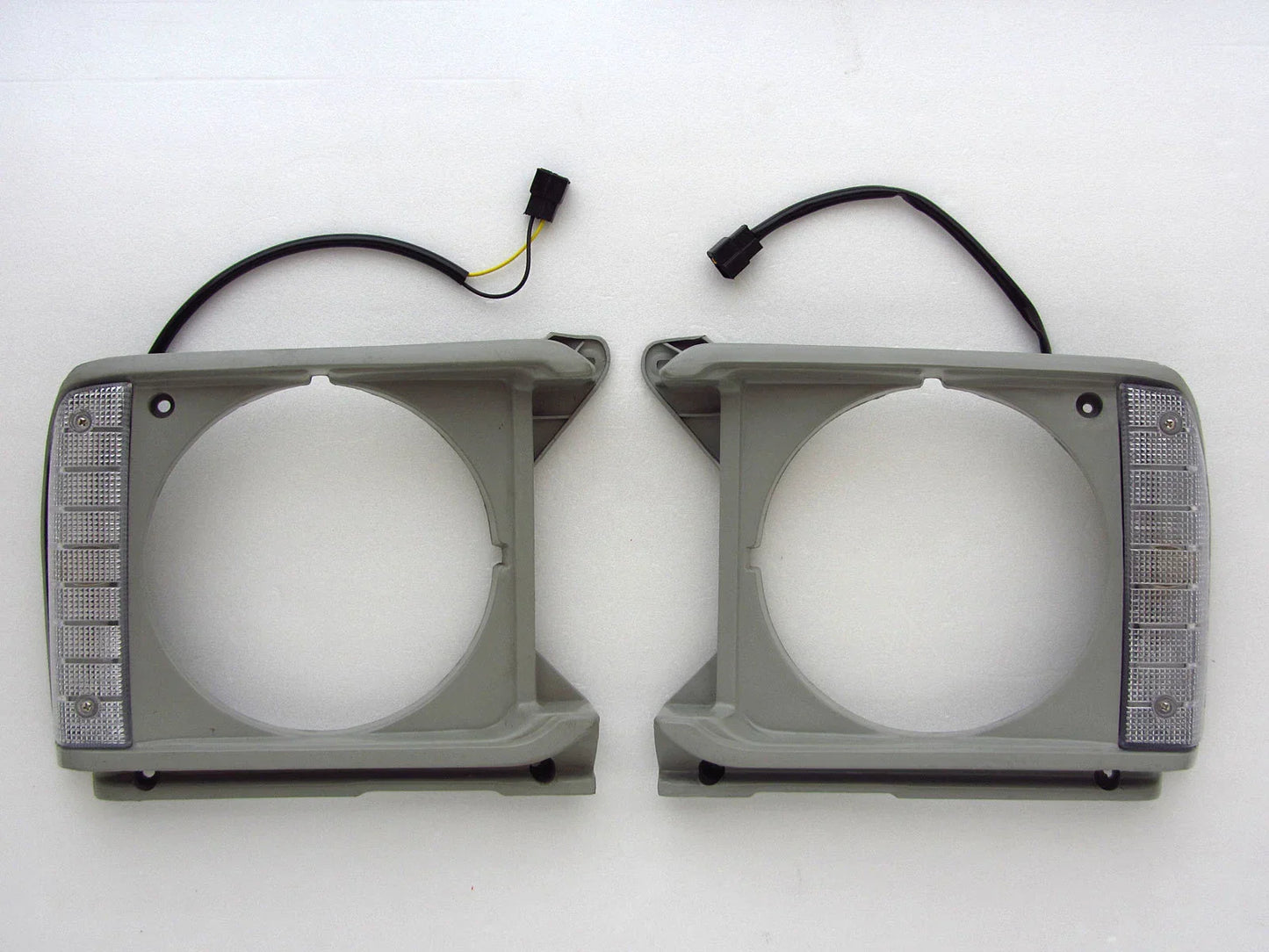 Toyota Hilux RN30 Headlight Surround & Corner Lights - 2 x New (1979-1983)