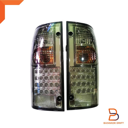 Smoked LED Tail Lights Pair for Toyota Hilux Ute LN167 SR5 (1997-2004)